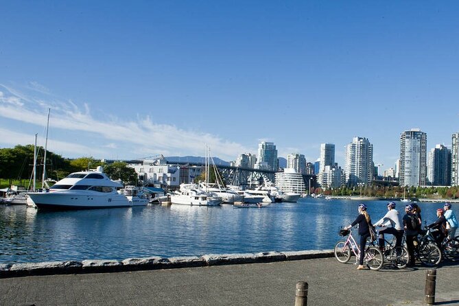 Stanley Park & Vancouver City Highlights 4 Hour Bike Tour 2 in 1 - Robson Square and the West End: shopping streets with story stops