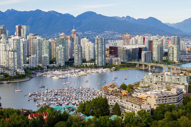 Vancouver City Finest Private Tour - Stanley Park: Totem poles, Prospect Point, seawall views, rose garden, Hollow Tree