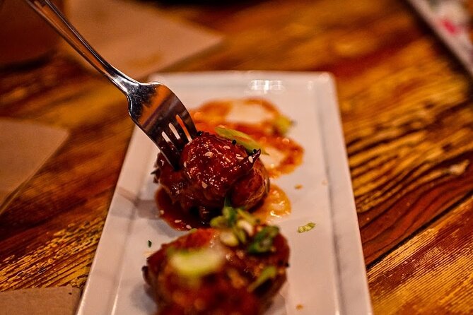 Vancouver Private Food Tour – Taste 6+ Local Dishes & Fresh Sushi - Olympic Cauldron: the 2010 torch that still shows up in conversation